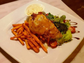 Chicken steak gratinated with bacon and cheddar, fried sweet potato, fresh salad, cucumber alioli sauce