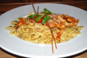 Farfalle served with creamy flap mushroom sauce