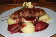 Pan fried duck breast with grilled camembert, poultry liver croquette, pear steamed in red wine, mashed potato