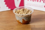 Chia pudding with peanut butter, banana and granola crunch
