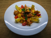 Vegetable curry tagliatelle with salmon and shrimp