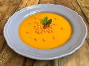 Sweet potato cream soup with leek sheep's curd and bacon crumbs