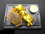 Ribeye steak with tempura broccoli, potatoes and goose liver sauce