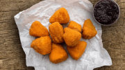 Deep-fried camembert snacks with cranberry jam