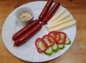 Grilled pork sausage, mustard, bread