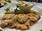 Grilled chicken breast fillet with mozzarella and tomatoes