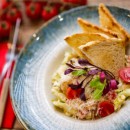 Caesar salad with grilled chicken breast and toast