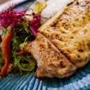 Chicken breast steak with serrano ham and smoked cheese gratin, jasmine rice, citrus balsamic fresh salad