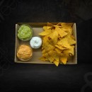 Tortilla chips with sauce 