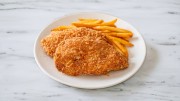 Fried chicken breast with french fries