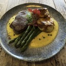 Beef rump steak 230g, buttered green asparagus, truffle hollandaise sauce, gratin potatoes