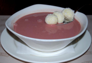 Cream of  strawberry soup with coconut ricotta balls